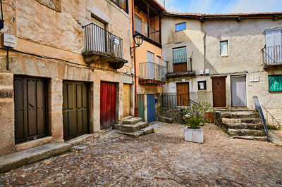 Houses by street in town