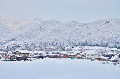 Scenic view of snow covered mountains