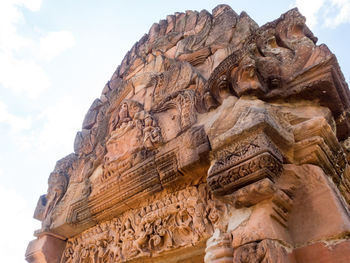 Low angle view of statue against sky