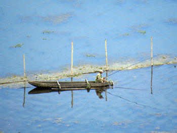 High angle view of sailboat in lake