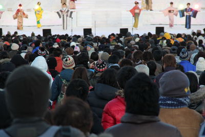 Rear view of people looking at music concert