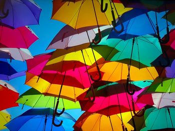 Low angle view of multi colored umbrellas