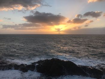 Scenic view of sea against sky during sunset