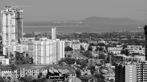 High angle view of buildings against sky in city