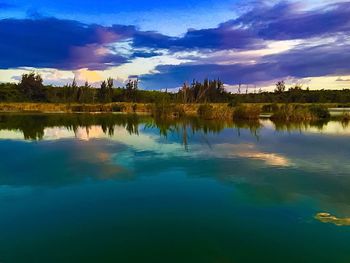 Reflection of clouds in calm lake