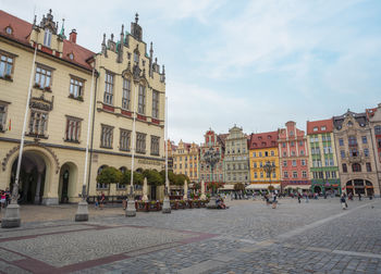 Buildings in city against sky