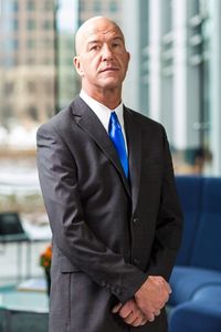 Portrait of businessman standing in office