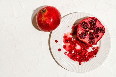 Directly above shot of fruits in plate on table