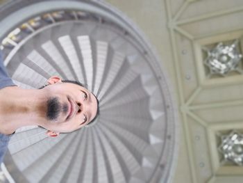 Low angle view of man against cupola