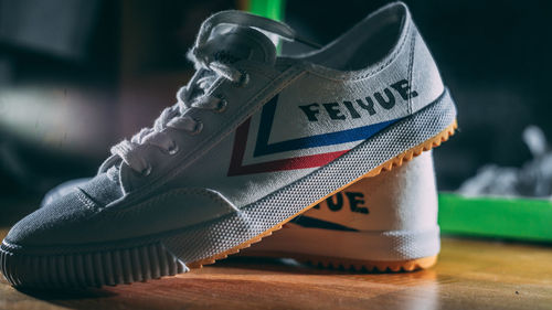 Close-up of shoes on table