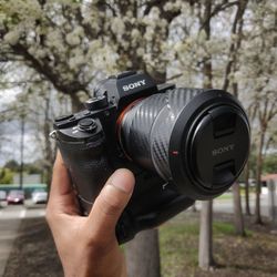 Close-up of hand holding camera