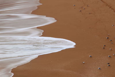 High angle view of sand on beach