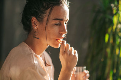 Close-up portrait of a young woman