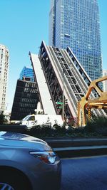 Low angle view of modern building against sky