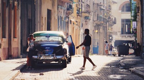 Man walking on street in city