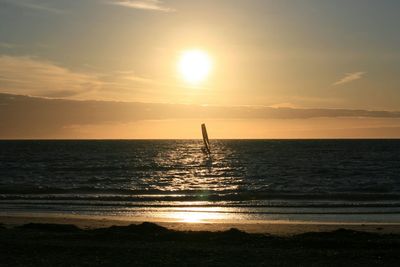 Scenic view of sea at sunset