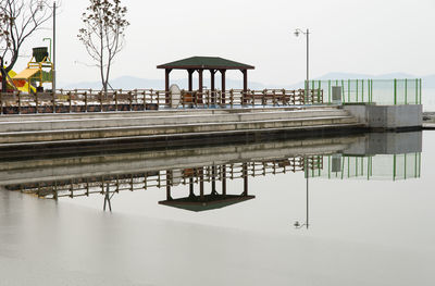 Gazebo on pier at lake