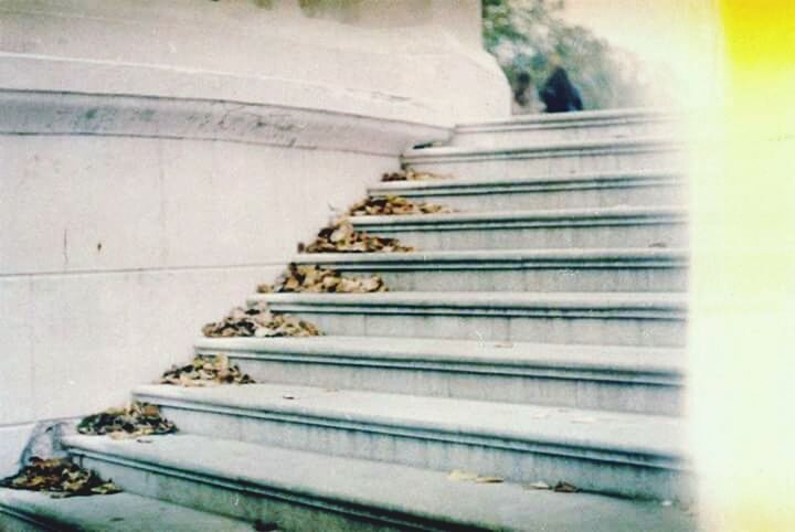 steps, steps and staircases, staircase, the way forward, built structure, wall - building feature, architecture, indoors, railing, stairs, day, sunlight, no people, diminishing perspective, building exterior, wall, selective focus, low angle view, close-up