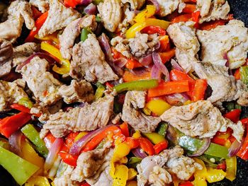 Cooked pork with bell peppers