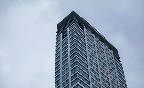 Low angle view of modern building against sky