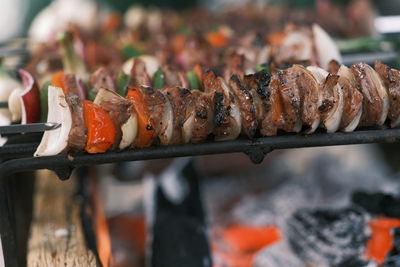 Close-up of meat on barbecue grill