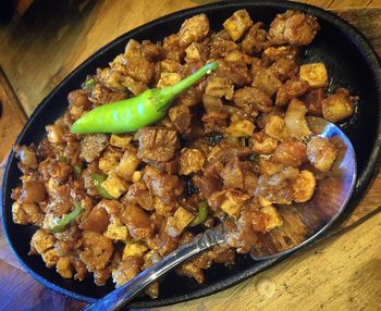 Close-up of meat in container