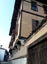 Low angle view of old building against sky