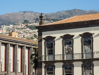 Low angle view of residential buildings against sky