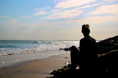 Scenic view of sea at sunset