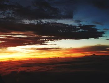 Low angle view of dramatic sky during sunset