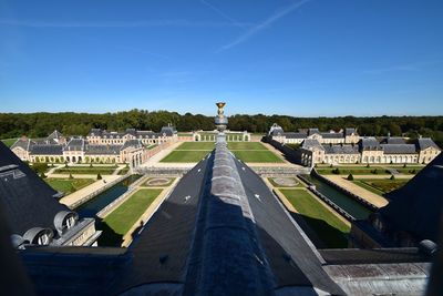 Panoramic shot of historic building against blue sky