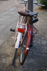 High angle view of bicycle parked on footpath