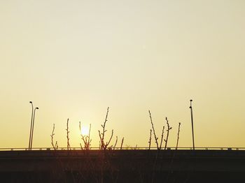 Silhouette of built structure against clear sky