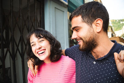 Portrait of a smiling young couple