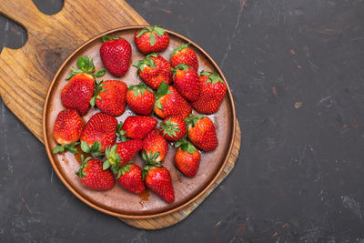 High angle view of strawberries on table