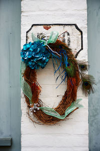 Close-up of rope tied hanging on wall