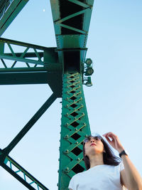 Low angle view of man against sky