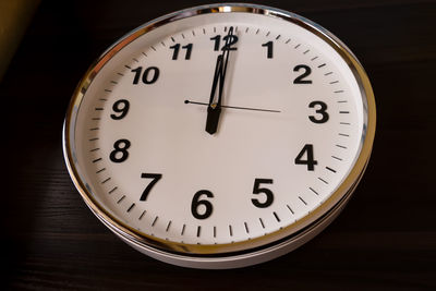 Close-up of clock on wall