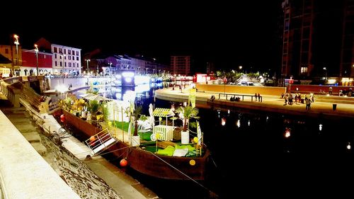 View of illuminated city at night