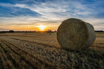 Hay stack at sunset