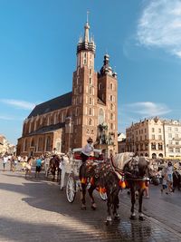 Sunny summer day in main market square krakow