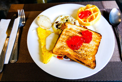 High angle view of breakfast served on table