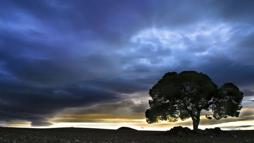 View of storm clouds over landscape