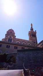 Low angle view of church against blue sky