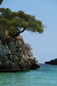 Scenic view of sea against clear blue sky