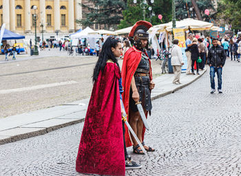 Women standing on street in city