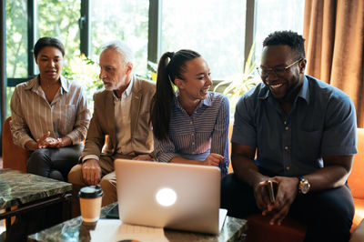 Business colleagues working at office