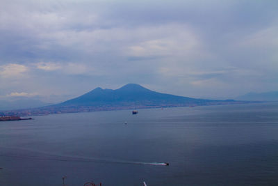 Scenic view of sea against cloudy sky