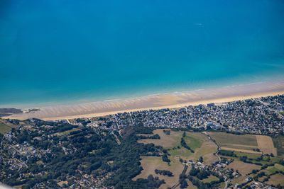 High angle view of beach against blue sky