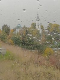 Close-up of wet window during rainy season